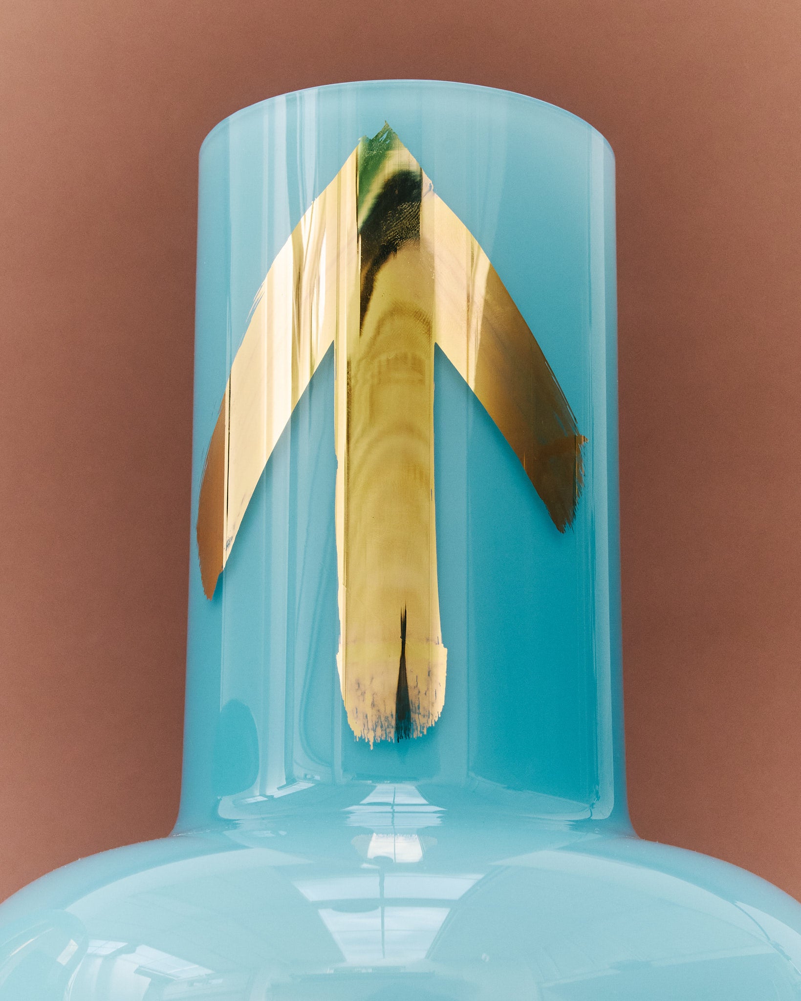 Detail of Unnamed Baby váza in turquoise with a gold LOVE inscription, showcasing unique design by Jakub Berdych Karpelis.