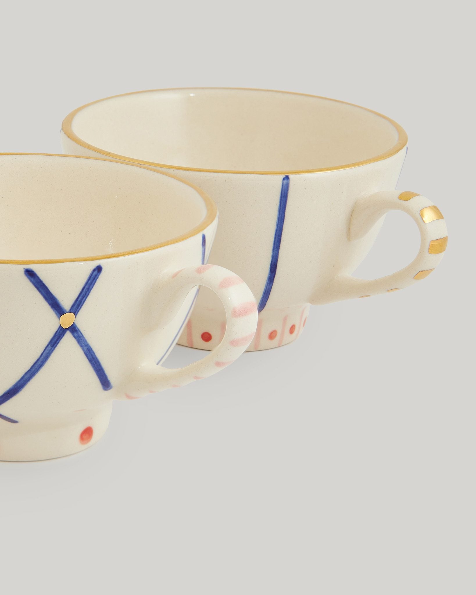 Multicolour cups & saucer (set of 2)